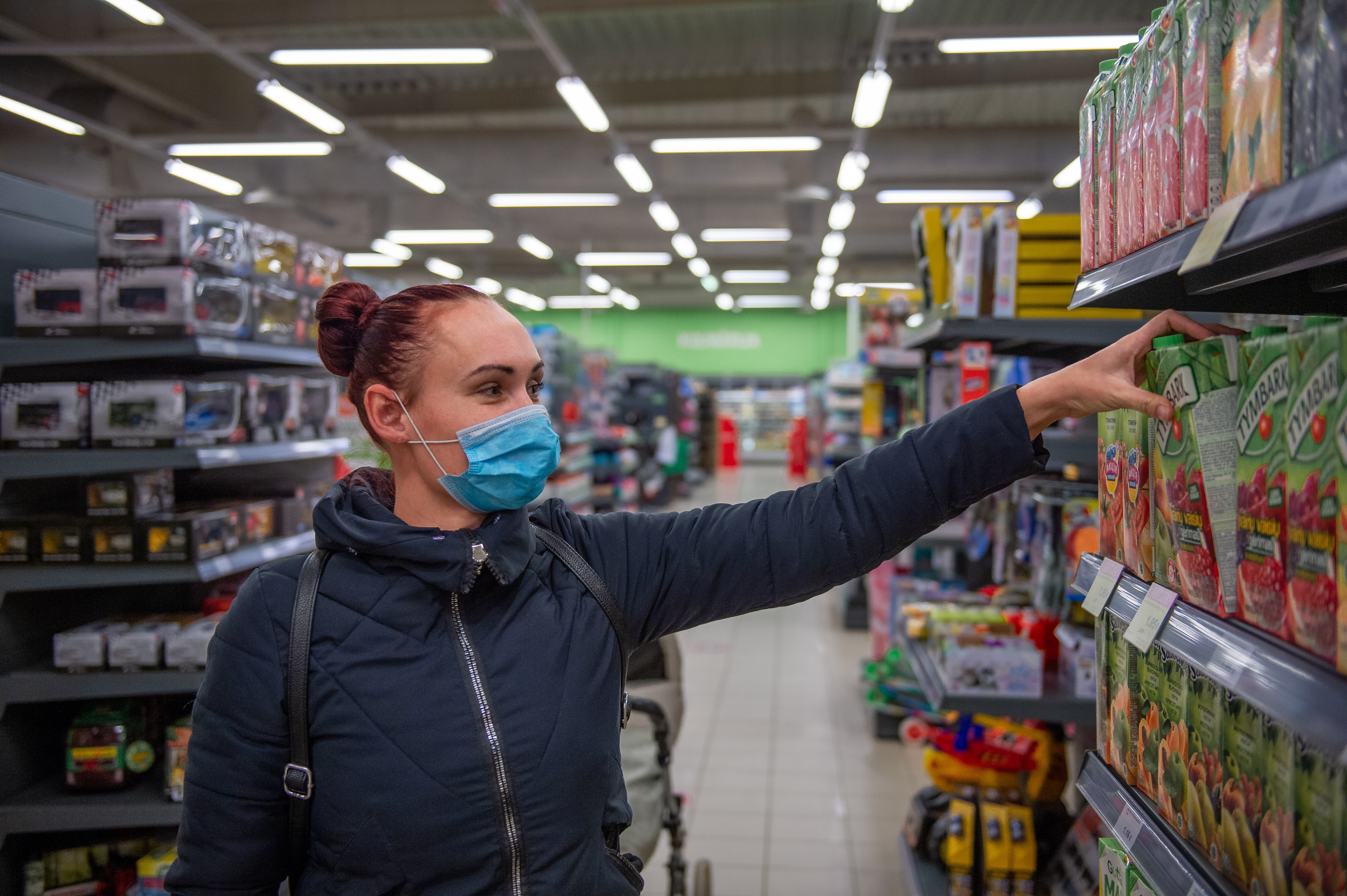 A shopper in a grocery store 
