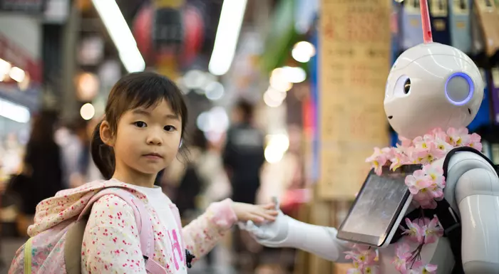 A child and a robot