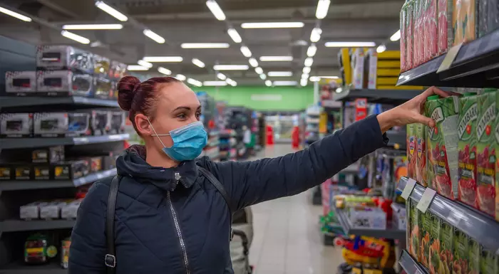 A shopper in a grocery store 