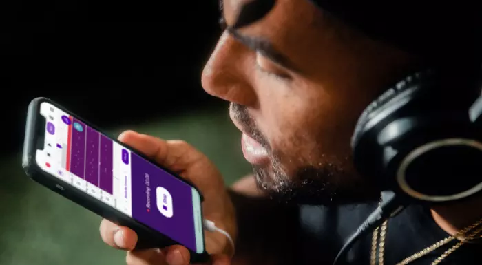 A man speaking into a mobile phone