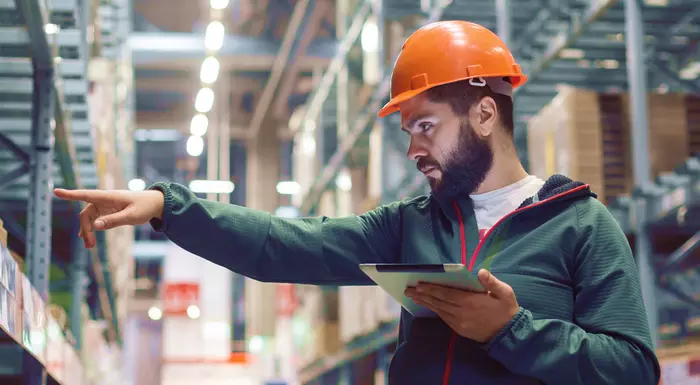 A worker examining data