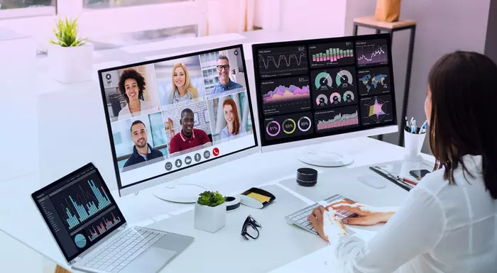 Someone sitting at a computer monitor